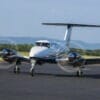 King Air 260 exterior on ground with engines running