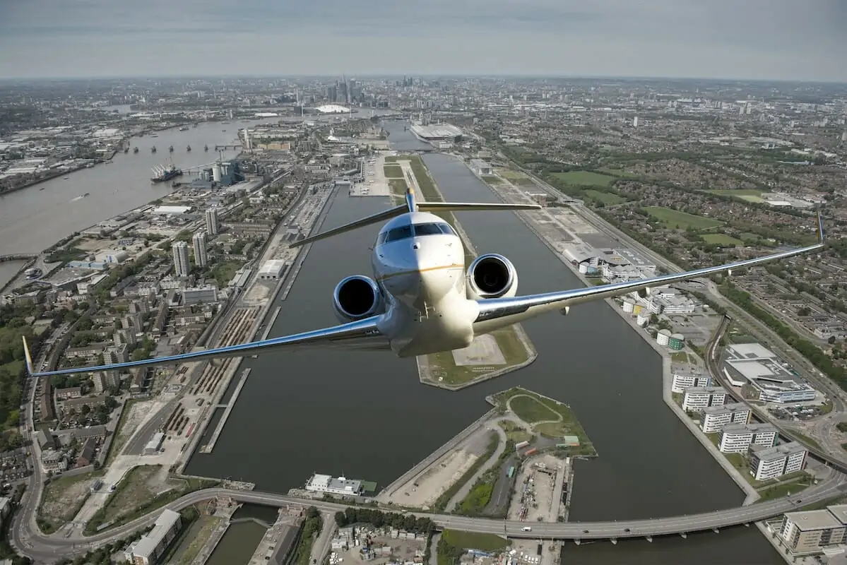 Bombardier Global 6000 Exterior takeoff from London City airport daytime