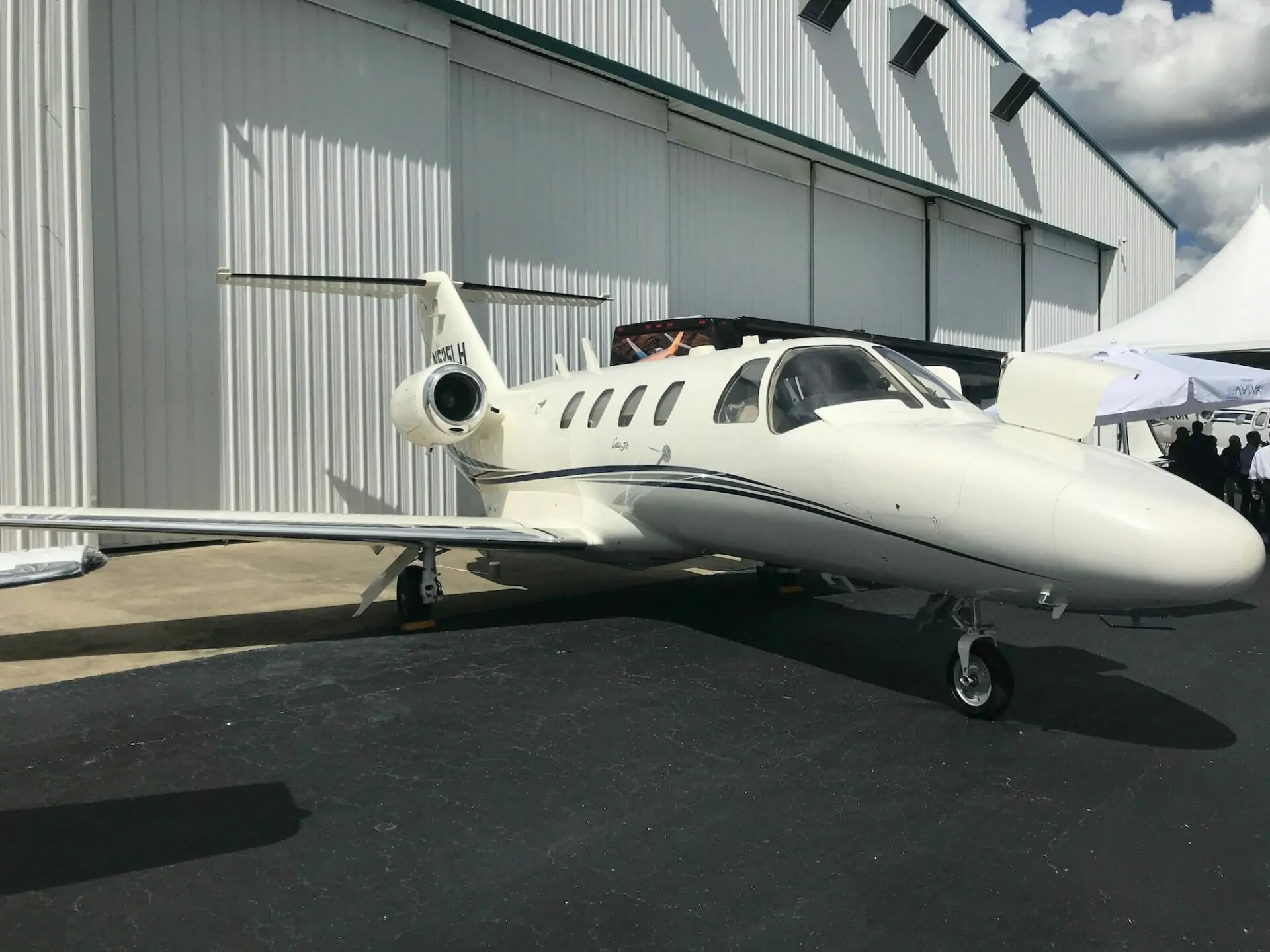 Cessna Citation CJ1 exterior at NBAA, tie-down private jet storage