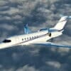 Cessna Citation Longitude Exterior white paint flying above clouds