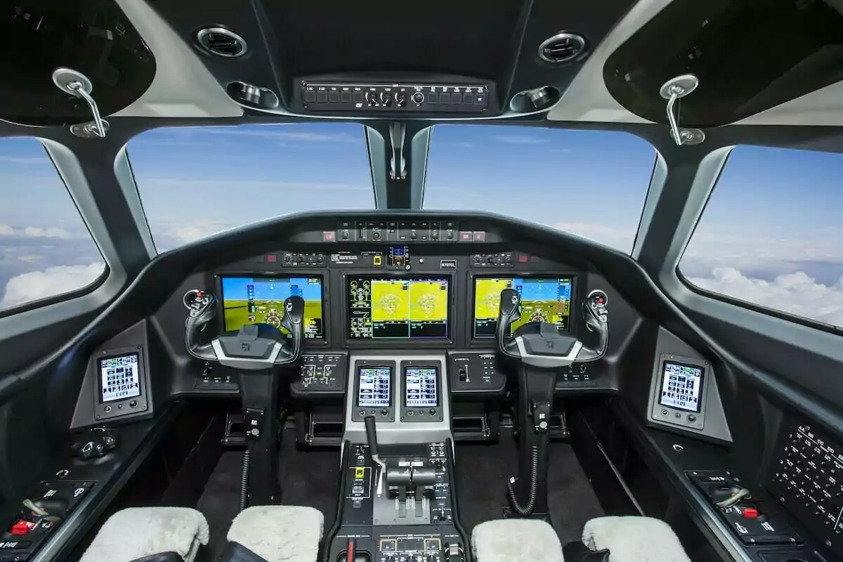Cessna Citation Longitude Cockpit in the air with powered on Garmin G5000 avionics suite