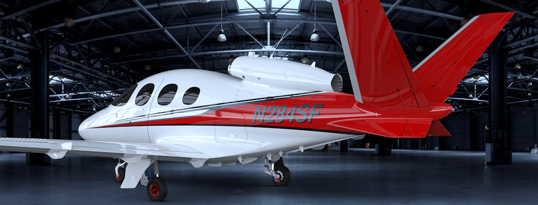 Cirrus Vision Jet SF50 Exterior red paint with wheels extended in hangar