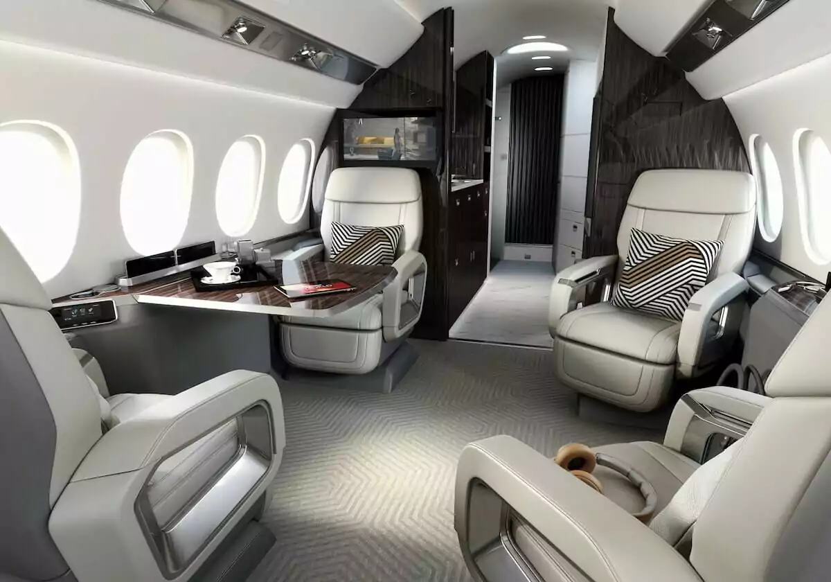 Falcon 6X interior seats in talking position with table extended