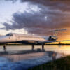 Embraer Legacy 650E Exterior on ground at sunset