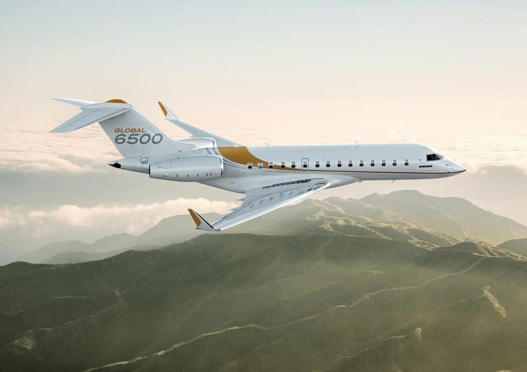 Bombardier Global 6500 Exterior Cruising Above Mountains