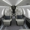 Pilatus PC-24 Interior, white leather seats with black trim, grey carpet
